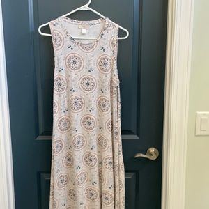Sleeveless swing dress. Size L